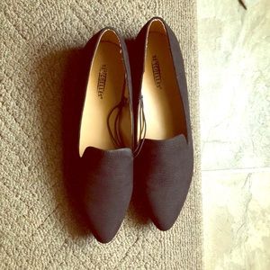 Black pointed loafers by Seychelles